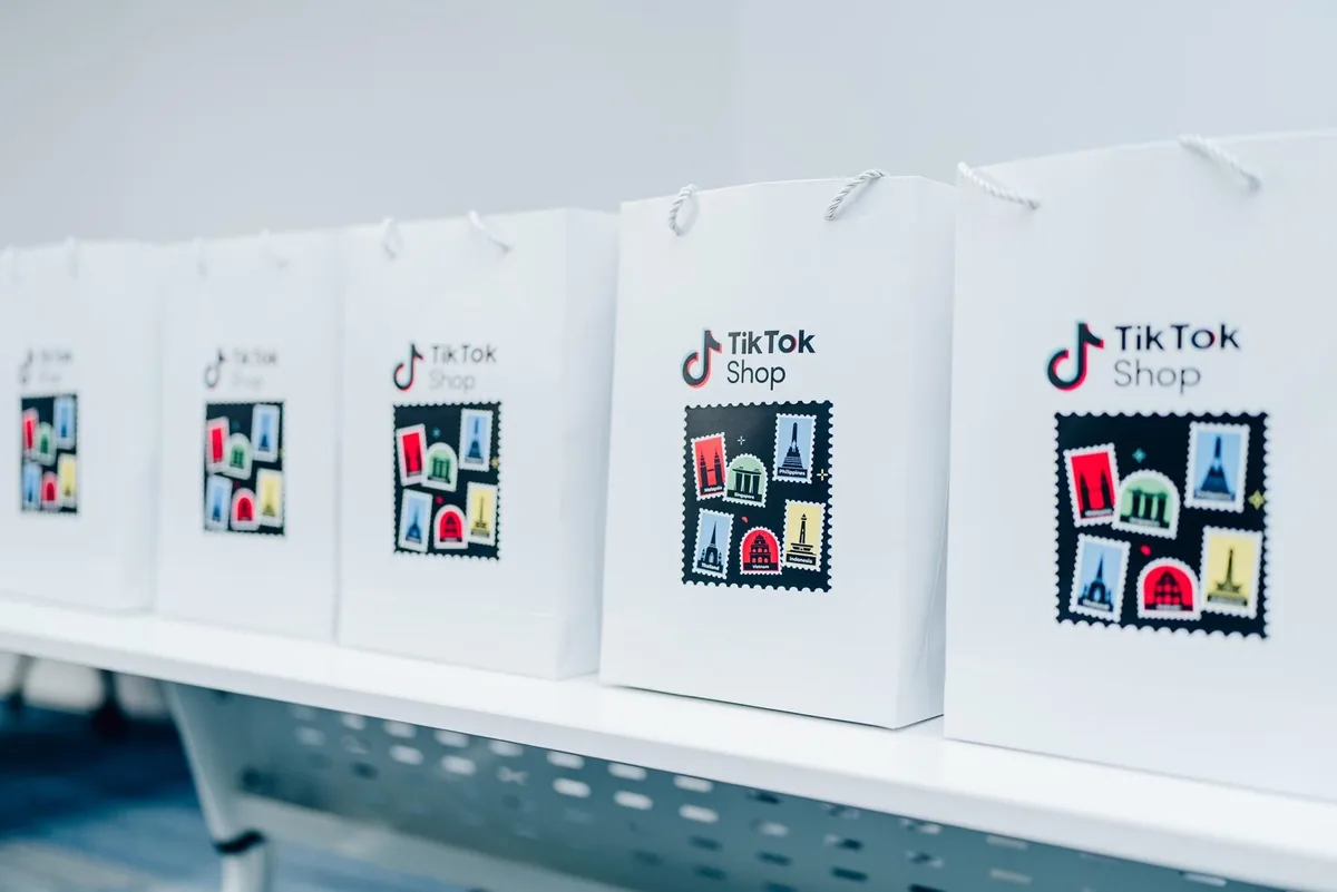 Branded TikTok Shop gift bags at an event